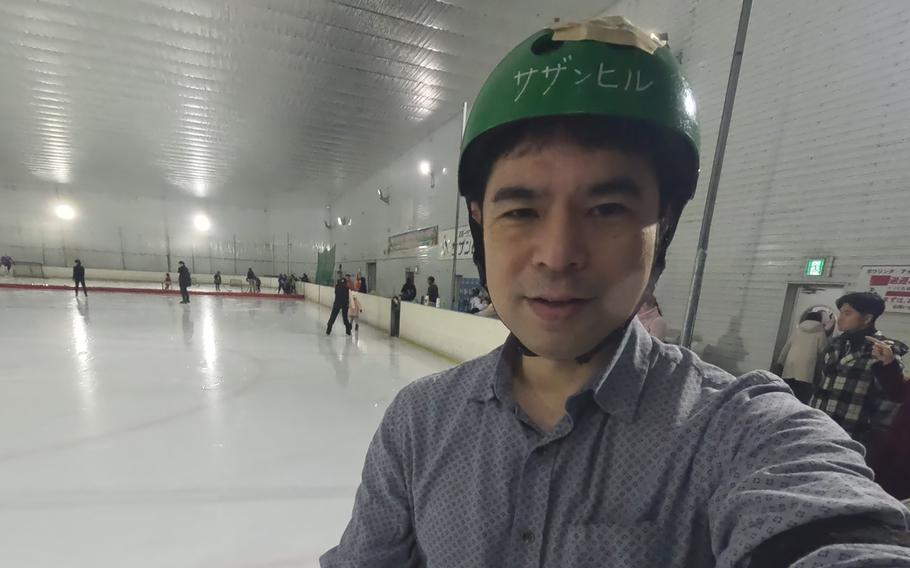 Shoji taking a selfie at the skate rink